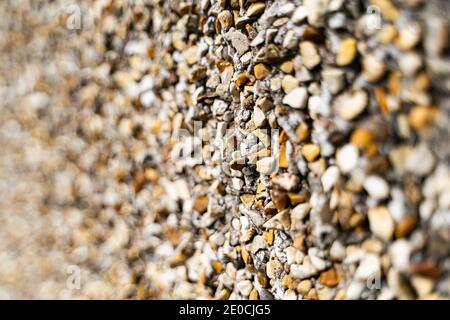 Peebledashed wall with shallow depth of field Stock Photo