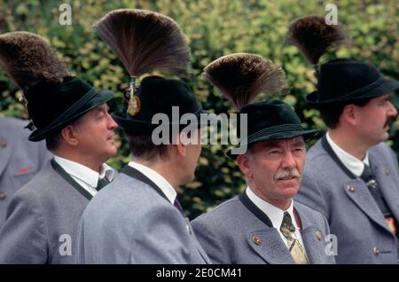Germany /Bavaria / Bavarian festival/ Four bavarian man wearing traditional cloth and bavarian hat . Stock Photo