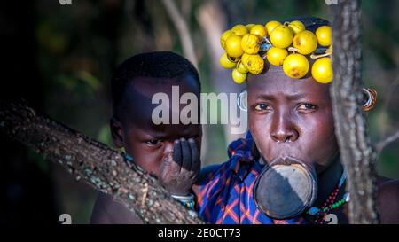 Surma woman, clay lip plate, Omo valley, Ethiopia Stock Photo