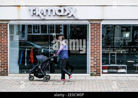 London UK, December 31 2020, Shoppers Walking Past A TK Maxx Discount  Outlet High Street Store Wearing Protective Face Masks Stock Photo - Alamy