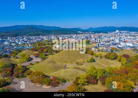 Panorama of Tumuli park and other royal tombs in the center of Korean town Gyeongju Stock Photo