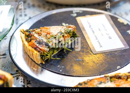 Slice of spinach and sweet potato pie at Greenwich Market, London, UK Stock Photo
