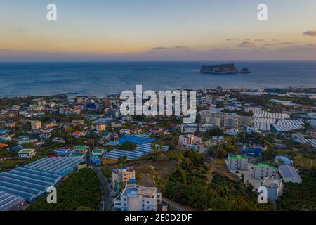 Sunset aerial view of Seogwipo town at Jeju island, Repubic of Korea Stock Photo