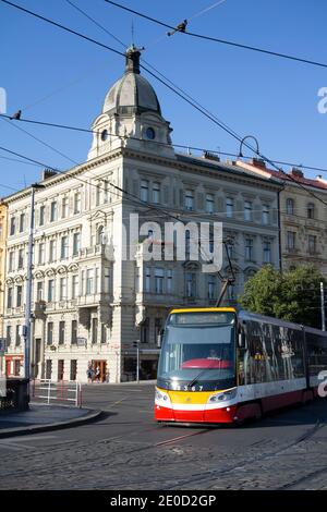 Prague, Czech Republic / Czechia - July 13, 2020: Tram and tramway on the sunny street. Public transport in the capital city. Stock Photo