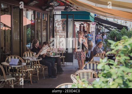 Paris, France - August 22, 2015: Le Mondrian, a 6th district cafe and restaurant with outdoor sidewalk seating in St. Germain, Paris Stock Photo