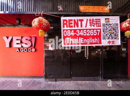 Pattaya, Thailand - December 31, 2020: The Covid-19 pandemic has had dire consequences for the resort city Pattaya in Thailand. This gogo-bar has clos Stock Photo