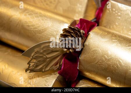 A classic British UK Christmas cracker with a golden acornA classic British UK Christmas cracker with a golden acorn Stock Photo