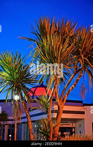 Red illuminated dome of the Marine Hall entertainment venue in Fleetwood at full moon Stock Photo