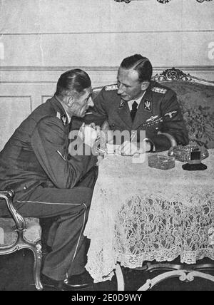 PRAGUE, PROTECTORATE OF BOHEMIA AND MORAVIA - CIRCA 1941: Reinhard Heydrich (right) and K.H. Frank at Prague castle. Stock Photo