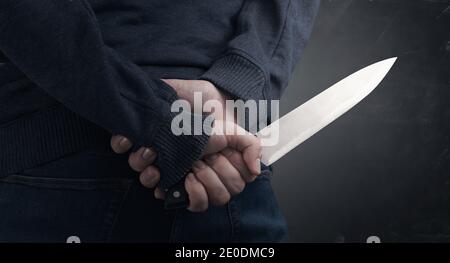 hand holding knife, murderer concept Stock Photo - Alamy