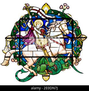 London, England UK. Church of St Lawrence Jewry - stained glass window. St George and the dragon - cutout Stock Photo