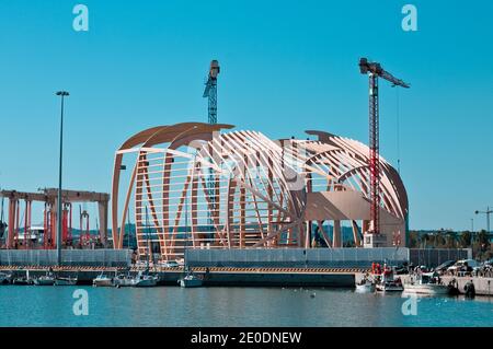 Pesaro, Italy - 09 july 2020: the wooden structure of a shipyard under construction in the harbour Stock Photo