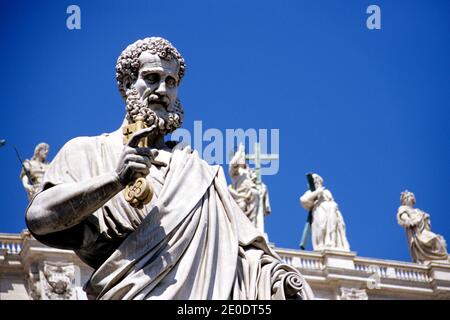 Statue of Saint Peter (with the keys to the church in hand) in St. Peter's Square, St. Peter's Basilica,Vatican, Rome, Italy. Stock Photo