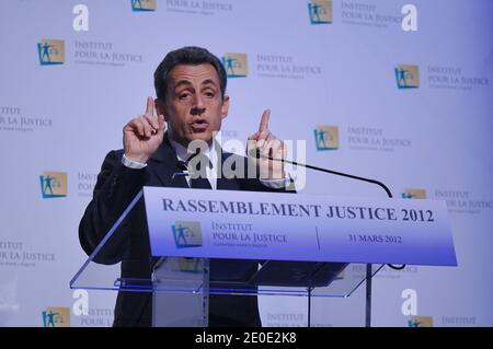 France's incumbent president and Union for a Popular Movement (UMP) party candidate for the French 2012 presidential election Nicolas Sarkozy delivers his speech during a seminar of the association 'Institut pour la Justice' (Institute for Justice) at the Maison de la Chimie, in Paris, France, on March 31, 2012. Photo by Christophe Guibbaud/ABACAPRESS.COM Stock Photo