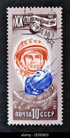 Cancelled postage stamp printed by Soviet Union, that shows The first manned space flight by Yuri Gagarin, circa 1977. Stock Photo