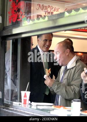 Republican politician Mitt Romney and former NYC mayor Rudy Giuliani buy some pizzas at the famous restaurant 'Joe's Pizza' in The West Village, New York City, NY, USA on May 1, 2012. Romney and Giuliani ran against each other in the 2008 GOP primary, during which Giuliani's leadership surrounding the events of 9/11 took center stage. Tuesday's impending event will be the first public meeting of the two Republicans. Photo by Charles Guerin/ABACAPRESS.COM Stock Photo