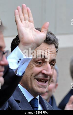 France's incumbent President and right-wing ruling party Union for a Popular Movement (UMP) candidate for the French 2012 presidential election Nicolas Sarkozy leaves a polling station in Paris, France on May 6, 2012 as part of the 2012 French presidential election second round vote. Photo by Christophe Guibbaud/ABACAPRESS.COM Stock Photo