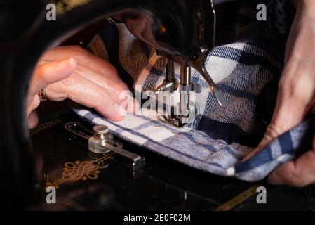 Sewing using old sewing machine Stock Photo
