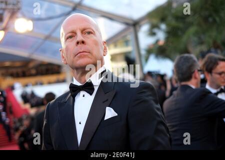 Bruce Willis wearing a Giorgio Armani tuxedo arriving for the