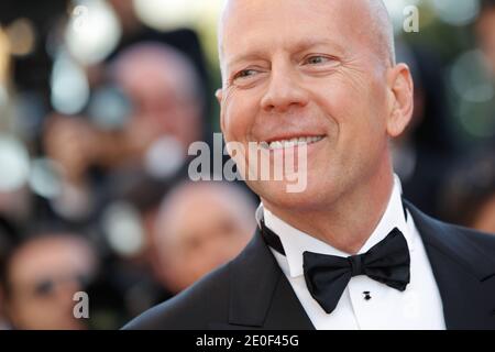 Bruce Willis wearing a Giorgio Armani tuxedo arriving for the