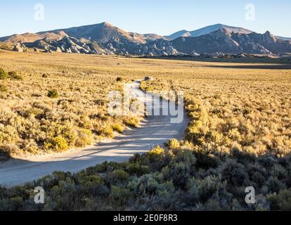 South Twin Sister Road as it winds through the sagebrush towards City of Rocks National Reserve proper, Idaho, USA. Stock Photo