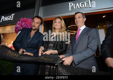 (L-R) Swiss rapper/actor Carlos Leal, Israeli supermodel Bar Refaeli and Piaget CEO Philippe Leopold-Metzger at the opening of Swiss jeweler Piaget's new flagship store in Geneva, Switzerland on May 10, 2012. Photo by Loona/ABACAPRESS.COM Stock Photo