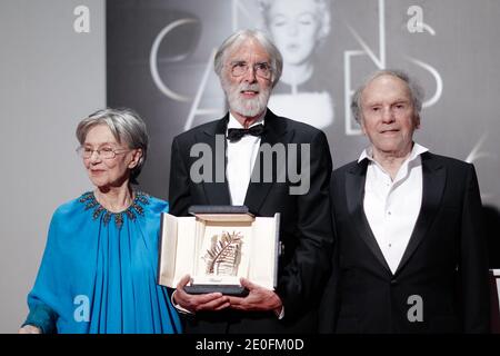 Palme D'Or for 'Amour', Austrian director Michael Haneke flanked by actress Emmanuelle Riva and actor Jean-Louis Trintignant posing at the Winners Photocall closing the 65th Annual Cannes Film Festival on May 27, 2012 in Cannes, France. Photo by Frederic Nebinger/ABACAPRESS.COM Stock Photo