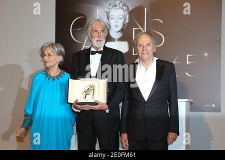 Palme D'Or for 'Amour', Austrian director Michael Haneke flanked by actress Emmanuelle Riva and actor Jean-Louis Trintignant posing at the Winners Photocall closing the 65th Annual Cannes Film Festival on May 27, 2012 in Cannes, France. Photo by Frederic Nebinger/ABACAPRESS.COM Stock Photo