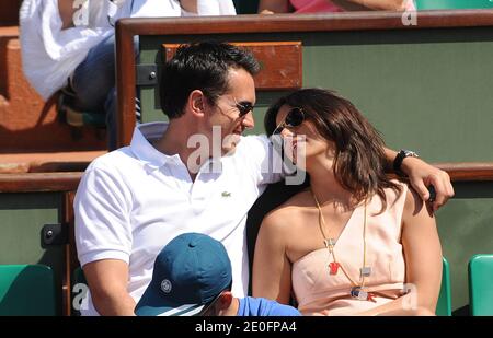 Faustine Bollaert and her boyfriend Maxime Chatame attending the men's 2nd tour of the French Open 2012, played at the Roland Garros stadium in Paris, France, on May 30, 2012. Photo by Gorassini-Guibbaud/ABACAPRESS.COM Stock Photo