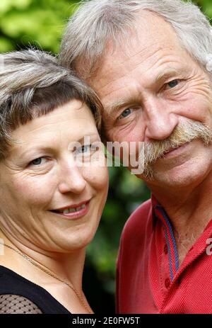 NO WEB NO APPS UNTIL JUNE 17, 2012. EXCLUSIVE - Green party 'Europe Ecologie' members, Marie Bove and father Jose Bove, pose ahead of a political rally for the parliamentary elections in Bordeaux, Southwestern France, June 2, 2012. Photo by Patrick Bernard/ABACAPRESS.COM Stock Photo