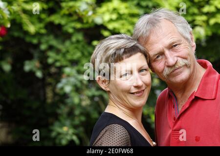 NO WEB NO APPS UNTIL JUNE 17, 2012. EXCLUSIVE - Green party 'Europe Ecologie' members, Marie Bove and father Jose Bove, pose ahead of a political rally for the parliamentary elections in Bordeaux, Southwestern France, June 2, 2012. Photo by Patrick Bernard/ABACAPRESS.COM Stock Photo