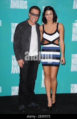 Jean-Claude Van Damme and daughter Bianca pose in the press room of the 2012 MTV Movie Awards held at the Gibson Theatre in Universal City, Los Angeles, CA, USA on June 3, 2012. Photo by Lionel Hahn/ABACAPRESS.COM Stock Photo