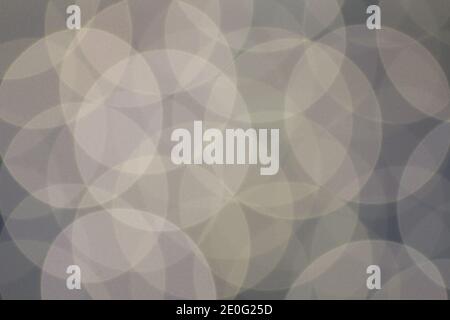 Blurred white lights on blue background. Large circles Stock Photo