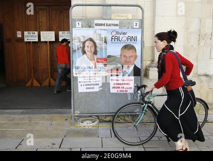 French Socialist Party (PS) candidate in the first constituency of Charente-Maritime department for the French parliamentary elections Segolene Royal and candidate in the first constituency of Charente-Maritime department for the French parliamentary elections Olivier Falorni's posters are seen in La Rochelle, western France, June 17, 2012. Photo by Patrick Bernard/ABACAPRESS.COM Stock Photo