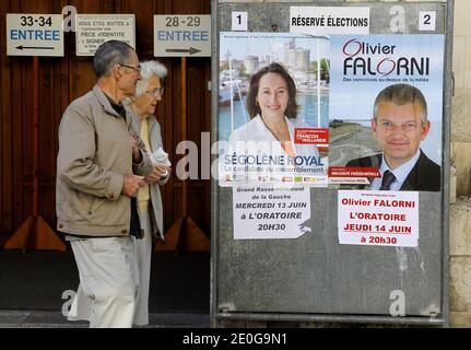 French Socialist Party (PS) candidate in the first constituency of Charente-Maritime department for the French parliamentary elections Segolene Royal and candidate in the first constituency of Charente-Maritime department for the French parliamentary elections Olivier Falorni's posters are seen in La Rochelle, western France, June 17, 2012. Photo by Patrick Bernard/ABACAPRESS.COM Stock Photo