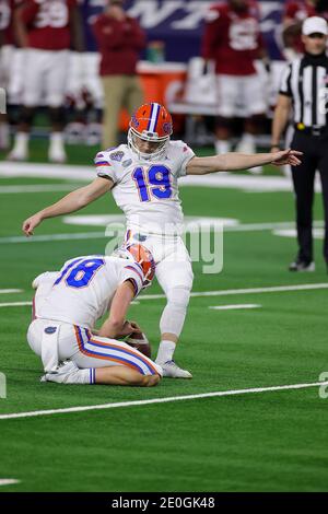 Nov 10 - Gainesville, FL, U.S.: Florida Gators place kicker Evan McPherson  (19) scores a PAT with Tommy Townsend holding during the second half of an  NCAA football game at against the