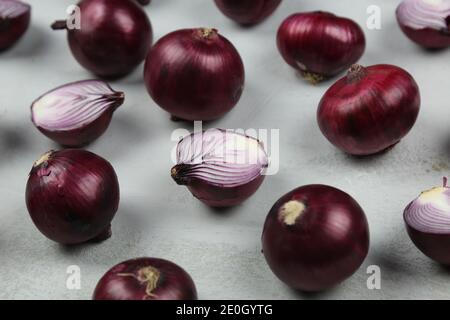 sweet red onions on background Stock Photo