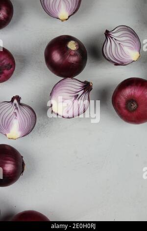 sweet red onions on background Stock Photo