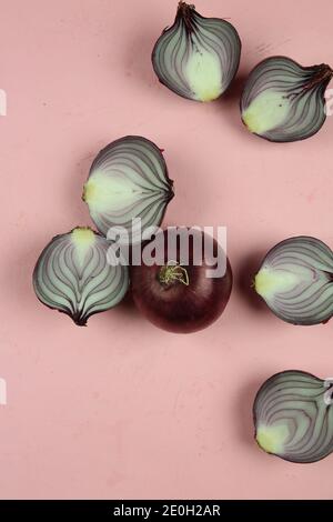 sweet red onions on background Stock Photo