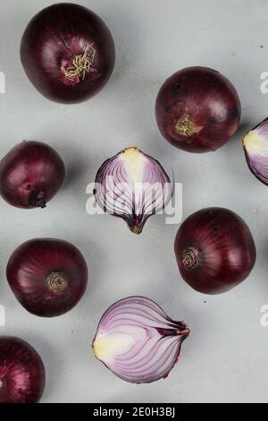 sweet red onions on background Stock Photo