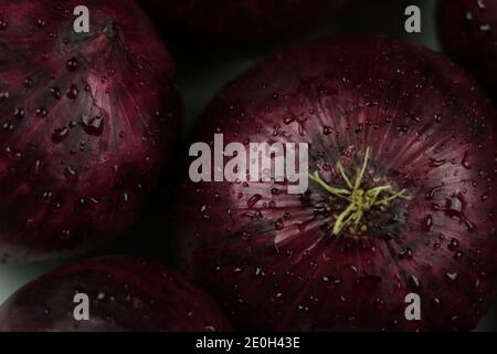 sweet red onions on background Stock Photo