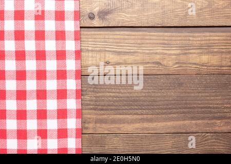 Rustic wooden and red checkeredbackground. Stock Photo