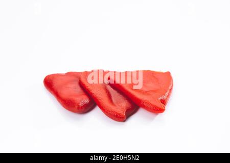 Roasted piquillo peppers isolated on  white background. Stock Photo