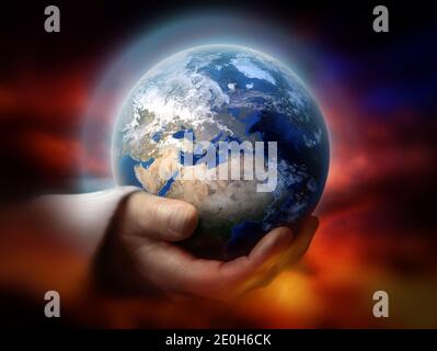 God holding the earth conceptual theme Stock Photo