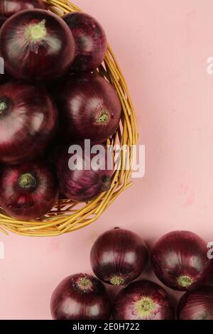 sweet red onions on background Stock Photo