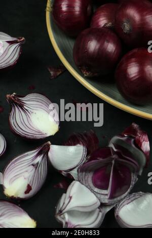 sweet red onions on background Stock Photo