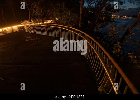 The Noosa boardwalk at night in Queensland, Australia. Stock Photo