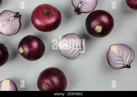 sweet red onions on background Stock Photo
