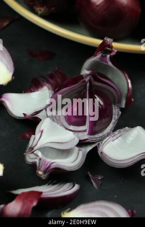 sweet red onions on background Stock Photo