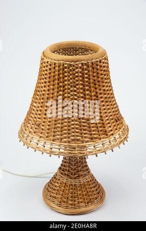 Master's handmade wicker lamp, night lamp on the table, good work Stock Photo